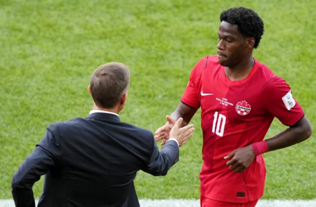 Canada's Jonathan David with coach Jesse Marsch