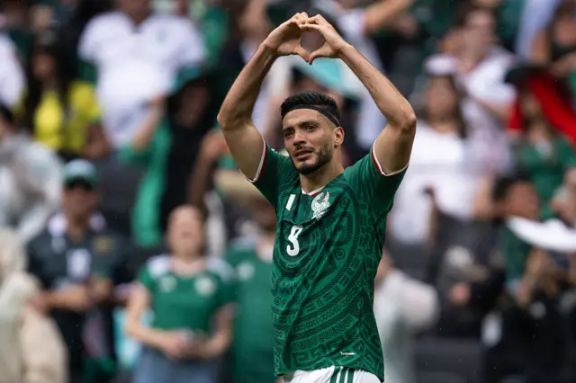 Raul Jimenez makes a heart shape with his hands