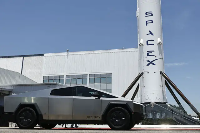 SpaceX signage outside the Space Exploration Technologies Corp. facility in Hawthorne, California, on June 3, 2026. SpaceX is set to begin trading on the Nasdaq under the ticker symbol SPCX.