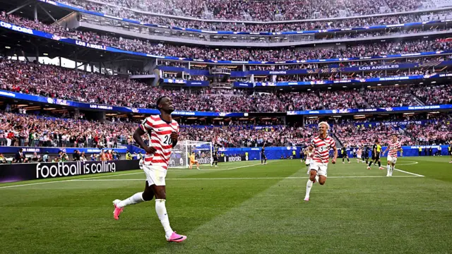 USA striker Folarin Balogun celebrates scoring in the Los Angeles Stadium