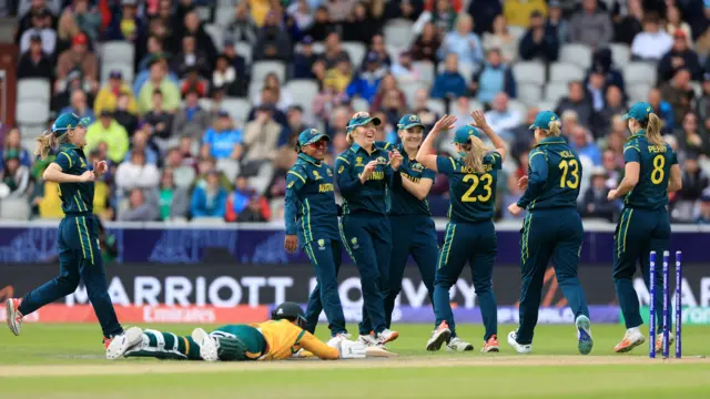 Australia celebrate a run out