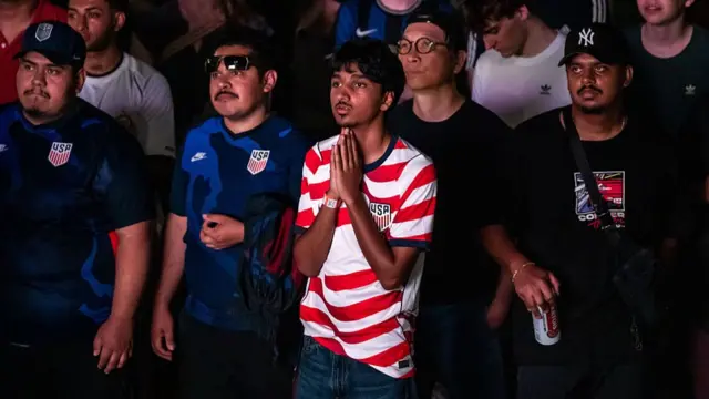 eople react at a watch party for USA vs. Paraguay in the FIFA World Cup 2026 at Intrepid Museum on June 12, 2026 in New York, New York.