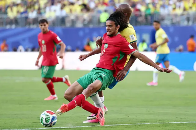 Ayyoub Bouaddi fights for the ball