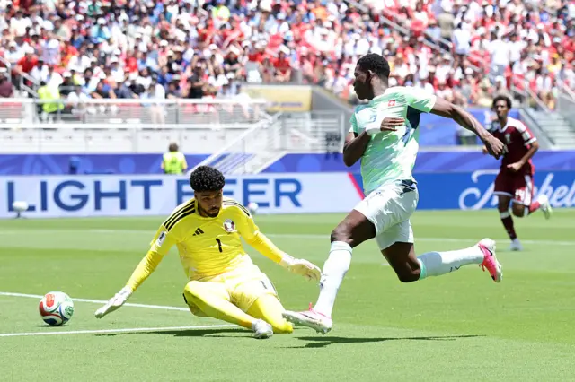 Breel Embolo #7 of Switzerland shoots and misses a chance against Mahmoud Abunada