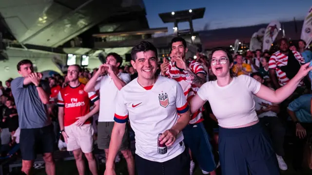 People celebrate as USA score the first goal against Paraguay in the FIFA World Cup 2026 at Intrepid Museum on June 12, 2026 in New York, New York.