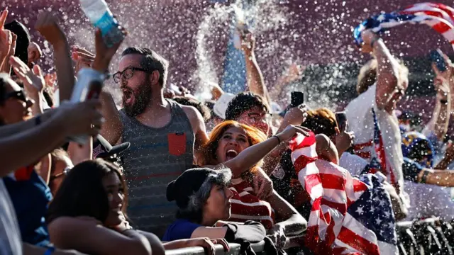 United States fans cheer after the U.S. scored their first goal in their World Cup match against Paraguay while watching the match at the FIFA Fan Festival at LA Memorial Coliseum on June 12, 2026 in Los Angeles, California. T