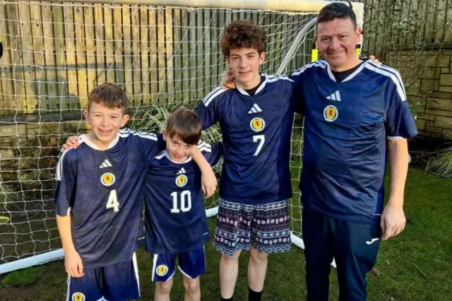 Andy Munro and his sons are football daft
