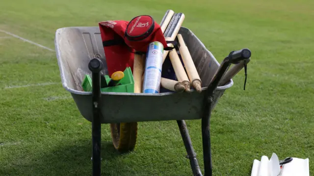 Cricket equipment in a wheelbarrow at Leicester