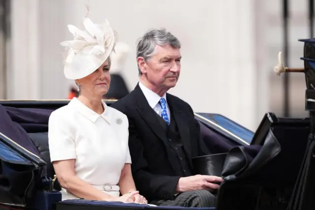 Duchess of Edinburgh and Sir Tim Laurence travel in a carriage