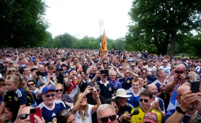 Scotland fans at the finish line in Boston trying to see Scotland fan Craig Ferguson who walked across the US to raise funds for a mental health charity.
