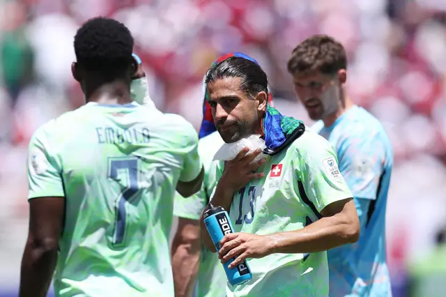 Ricardo Rodriguez #13 of Switzerland cools down with an ice pack