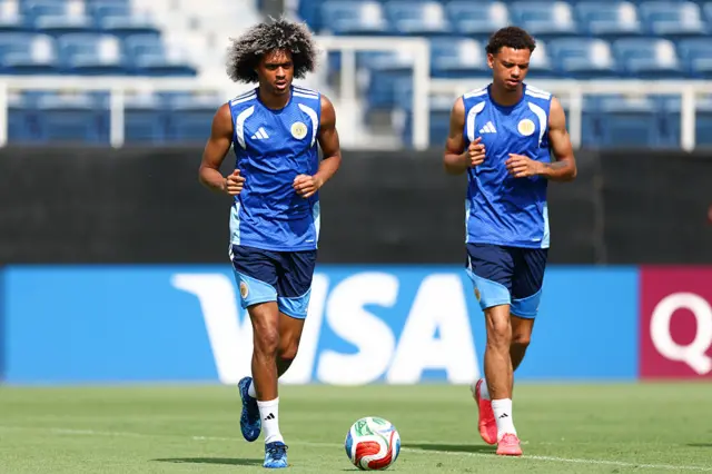 Tahith Chong warming up