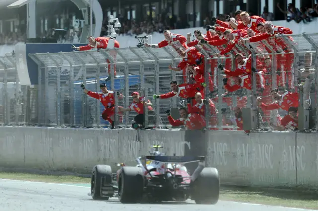 Ferarri team celebrate Hamilton's win at the Barcelona GP