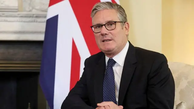 Prime Minister Keir Starmer pictures at 10 Downing Street in central London on June 14, 2026