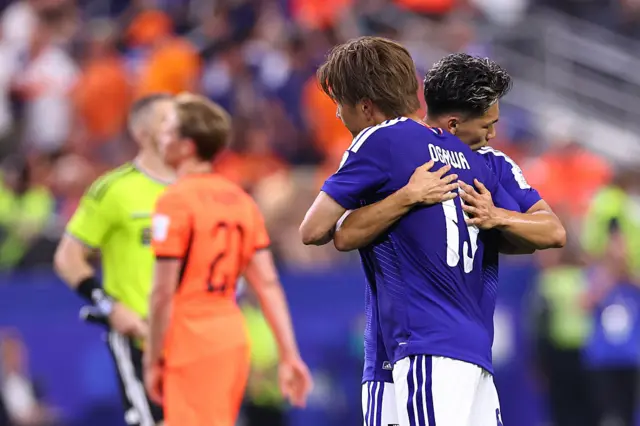Kento Shiogai celebrates with Koki Ogawa at full time
