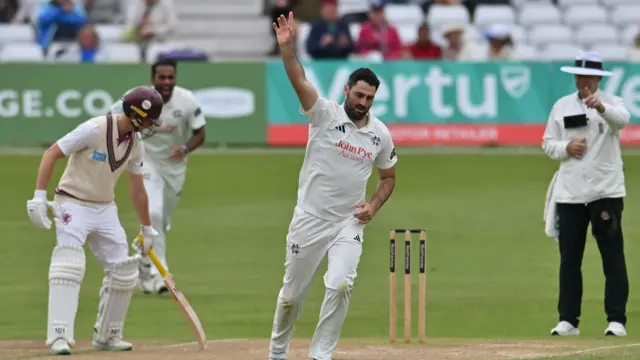 Brett Hutton celebrates getting out Lewis Goldsworthy