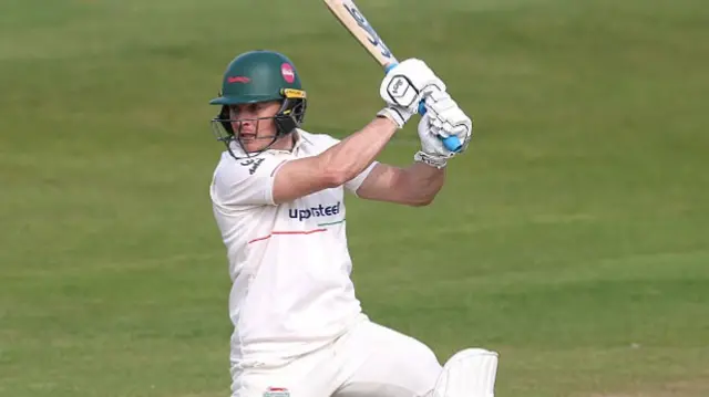 Ben Cox plays a shot