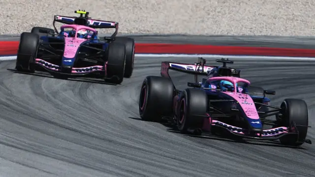 Gasly leading Colapinto during the Barcelona GP