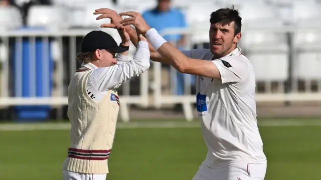 Craig Overton celebrates