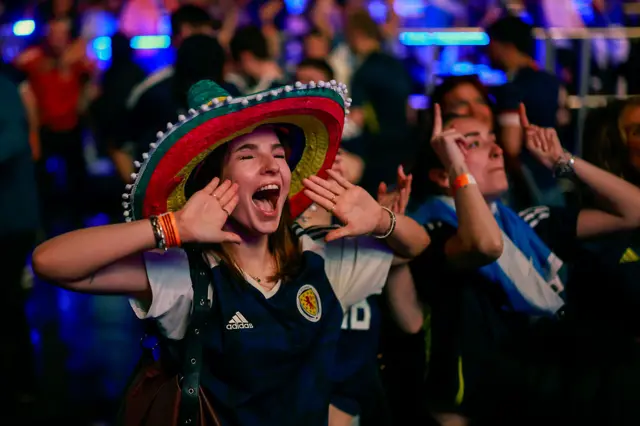 Scotland supporter wearing a Sombrero celebrates