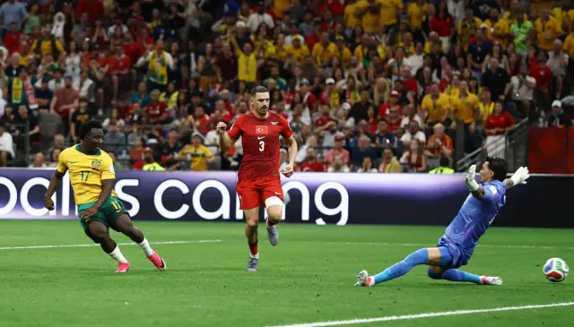 Australia's Nestory Irankunda scores their first goal against Turkey