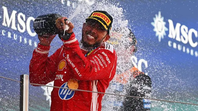 Lewis hamilton on the podium