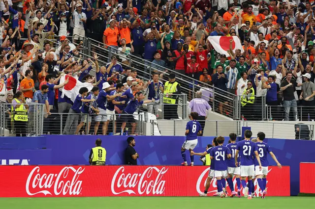 Japan players celebrate