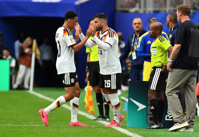 Deniz Undav of Germany (C) substitutes Jamal Musiala of Germany