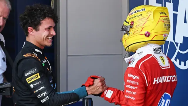 Norris and Hamilton shaking hands after the Barcelona GP