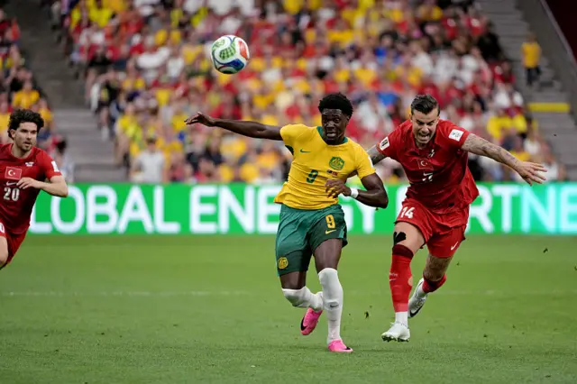 Mohamed Toure of Australia, Abdulkerim Bardakci of Turkey during the World Cup match between Australia v Turkey at the Vancouver Stadium