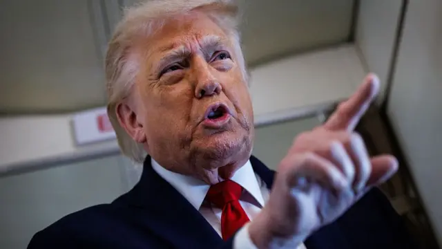 President Donald Trump speaks with reporters while aboard Air Force One en route to Chippewa Falls, Wisconsin on June 5, 2026