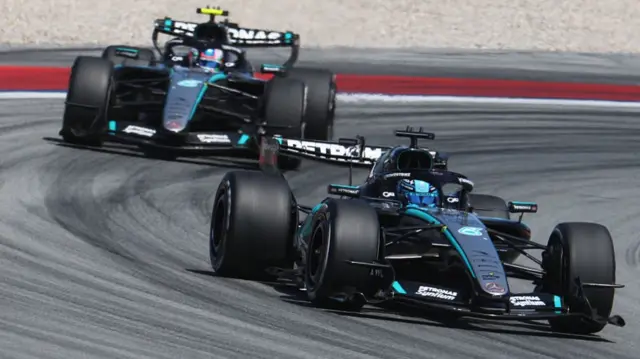 George Russell leading Kimi Antonelli during the Barcelona GP