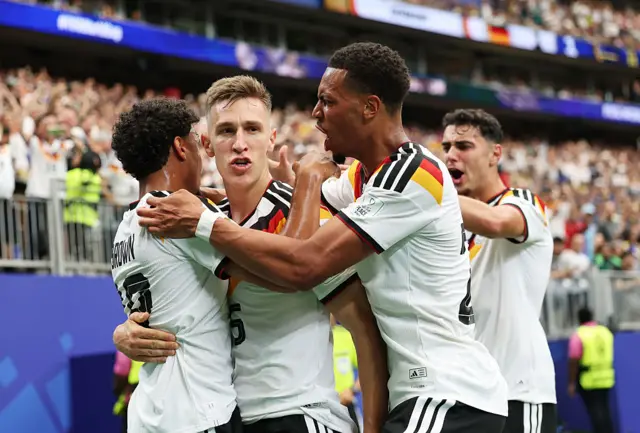 Nico Schlotterbeck #15 of Germany celebrates