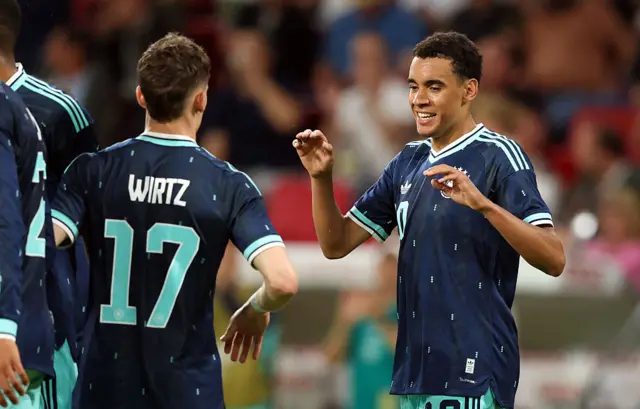 Florian Wirtz and Jamal Musiala in a Germany away kit