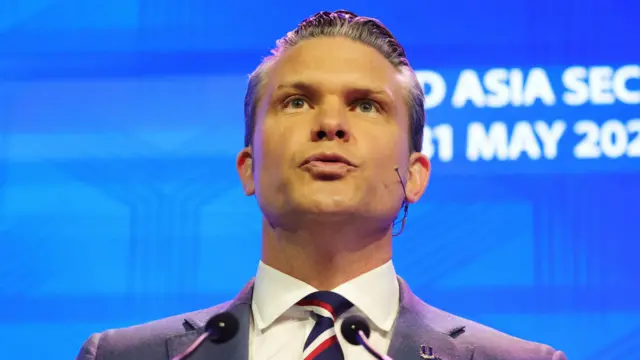 US Secretary of Defense Pete Hegseth delivers his speech during a plenary session of the International Institute for Strategic Studies (IISS) Shangri-la Dialogue Defence Summit in Singapore, 30 May 2026