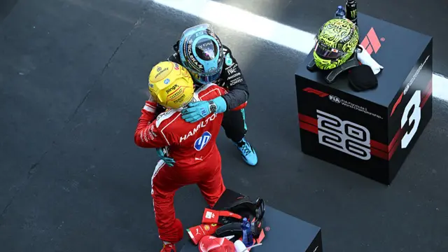 George Russell congratulating Lewis Hamilton