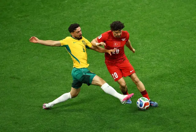 Turkey's Ferdi Kadioglu in action with Australia's Jacob Italiano
