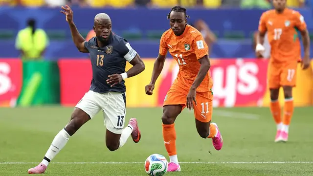 Enner Valencia and Yan Diomande compete for the ball