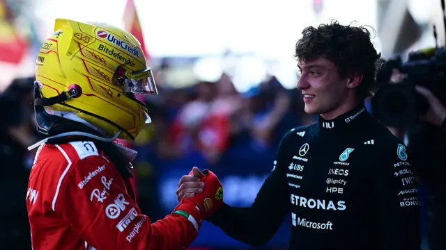 Kimi Antonelli congratulating Lewis Hamilton