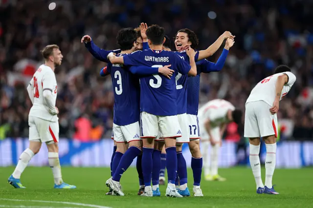 Japan celebrate against England