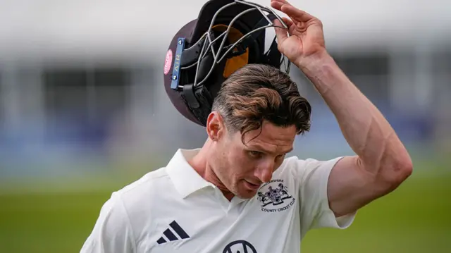 Cameron Bancroft removes his batting helmet
