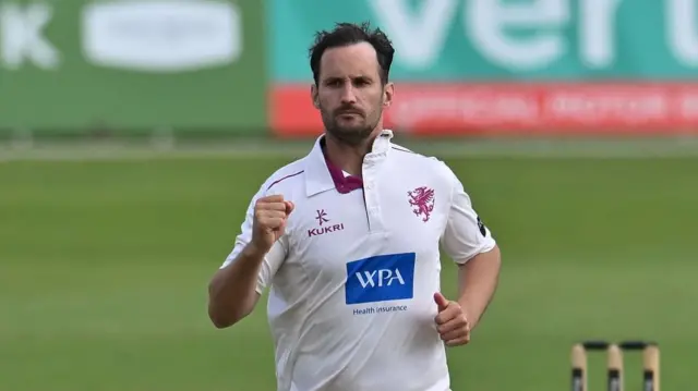 Lewis Gregory celebrates taking a wicket for Somerset