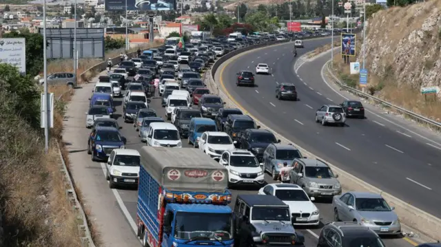 Rows of cars in standstill on a busy motorway