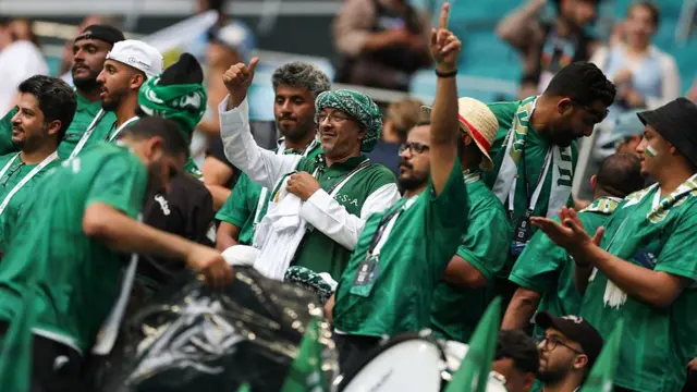 Saudi Arabian fans dressed all in green