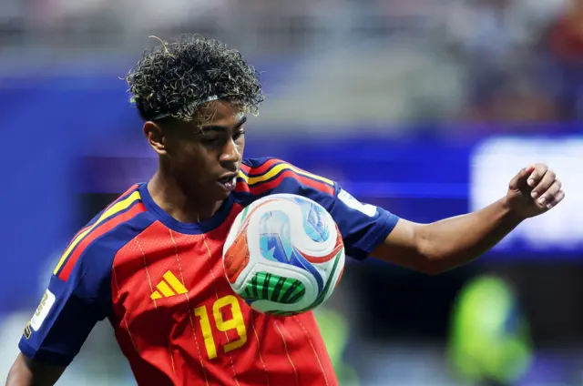 Spain's Lamine Yamal in action
