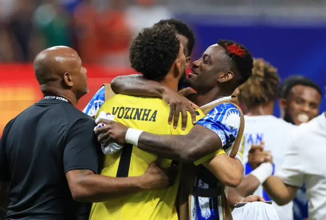 Cape Verde's Vozinha with teammates after the match