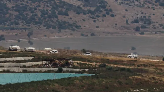 A United Nations Interim Force in Lebanon (UNIFIL) convoy moves in southern Lebanon, as seen from the Upper Galilee on the Israel-Lebanon border, 15 June 2026, amid a ceasefire between Israel and Hezbollah.