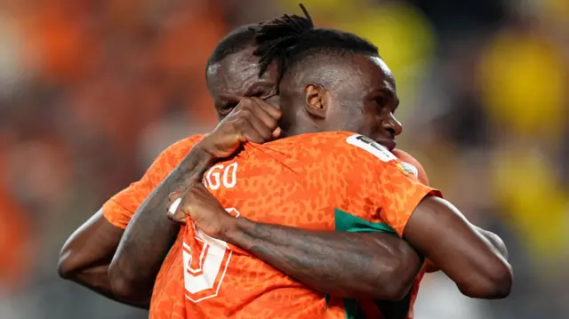 Wilfried Singo and Franck Kessie celebrate