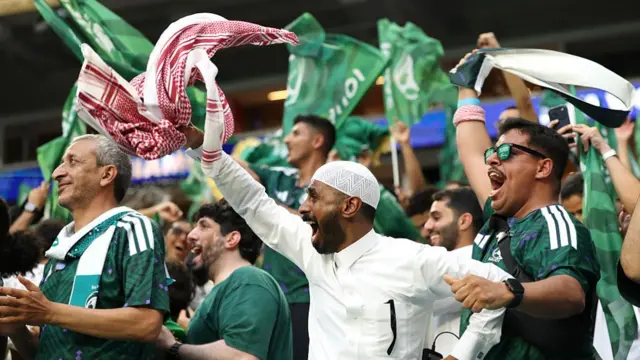 Fans of Saudi Arabia celebrate