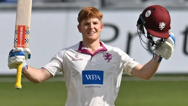 Thomas Rew celebrates his maiden century for Somerset against Notts